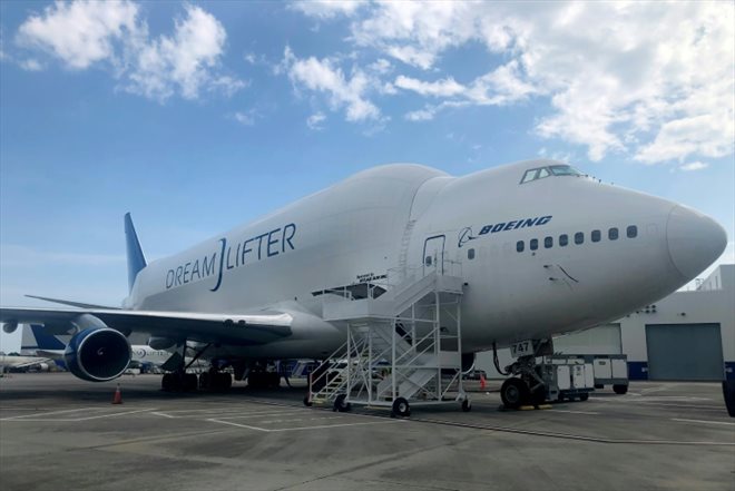 The Dreamlifter, an aircraft specially modified to carry parts of the Boeing 787, in the parking lot at the site in North Charleston, North Carolina