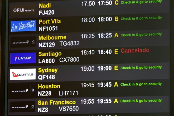 A Latam Airlines flight canceled on an information screen at Auckland airport, the day after a technical incident on a Boeing 787 of the company, March 12, 2024 in New Zealand