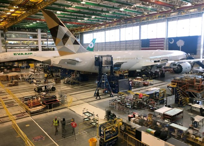 At the end of the 787 Dreamliner assembly line at the Boeing plant in North Charleston, North Carolina.  Finishings are done in the parking lot