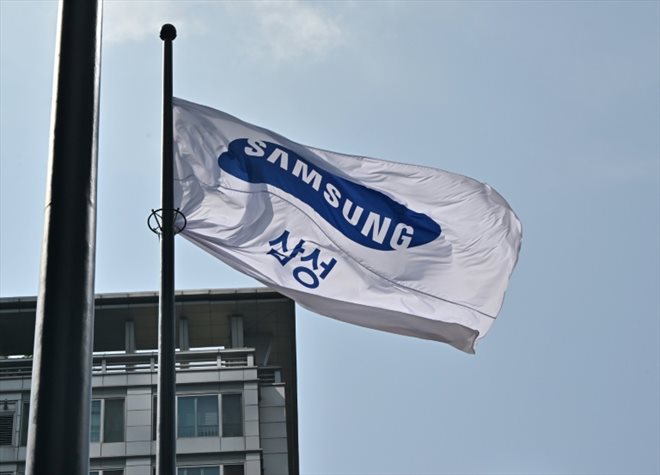 A Samsung flag flies over a Samsung building in Seoul in July 2022